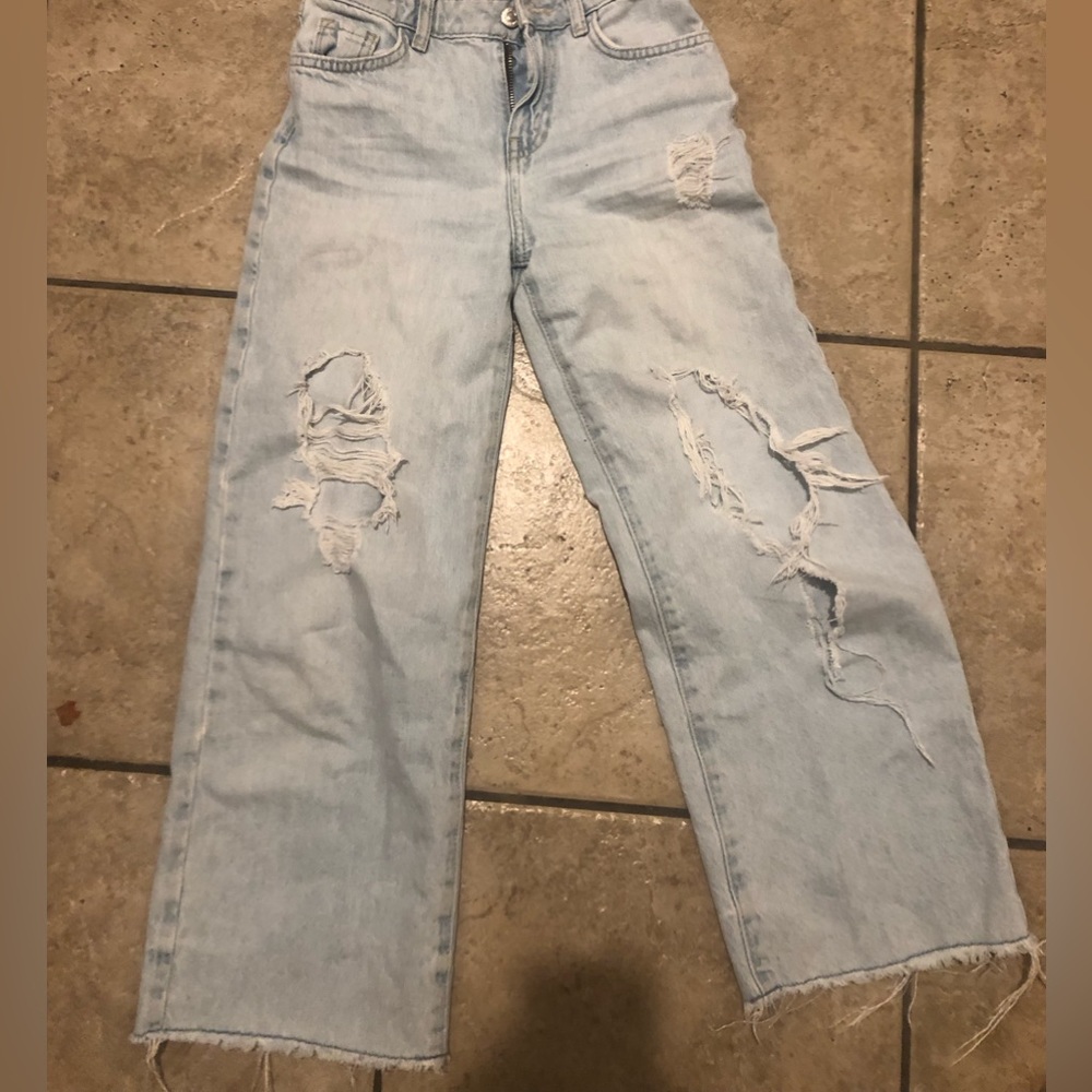 Selling old clothes. Don’t fit me anymore. Light blue. Denim. Forever 21